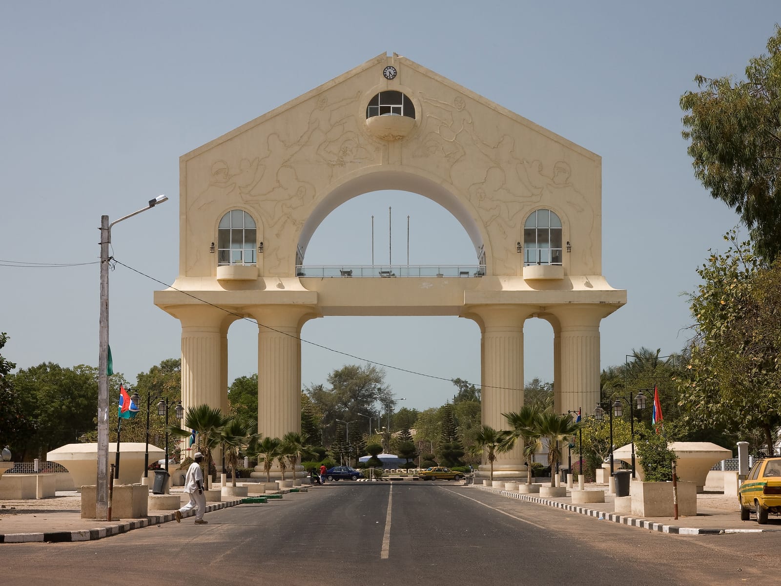 Arch 22 rising above the road into Banjul, The Gambia